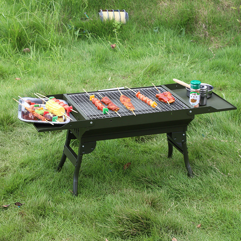 Outdoor foldable portable barbecue grill